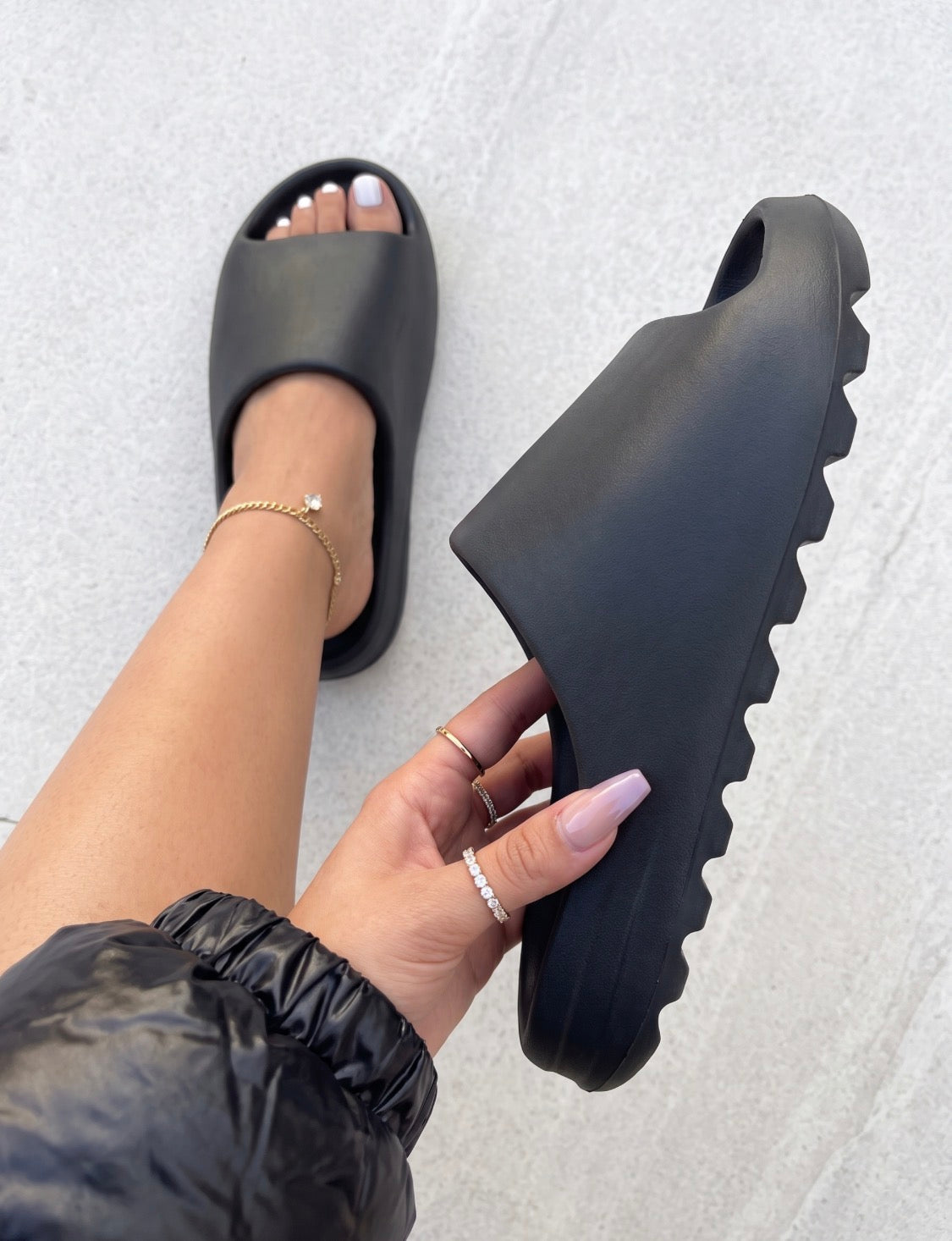 Black Cloud Slides on concrete